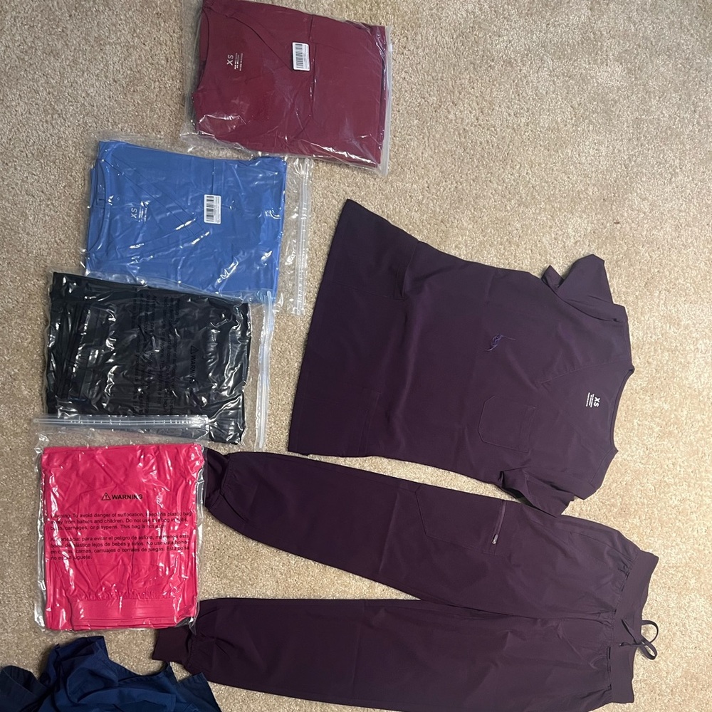 Brand new scrubs
10 pairs of scrubs shirt 
8 pants of scrub pants
Xsmall- small